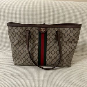 Gucci tote bag that bought on impulse but do not use. Almost brand new.